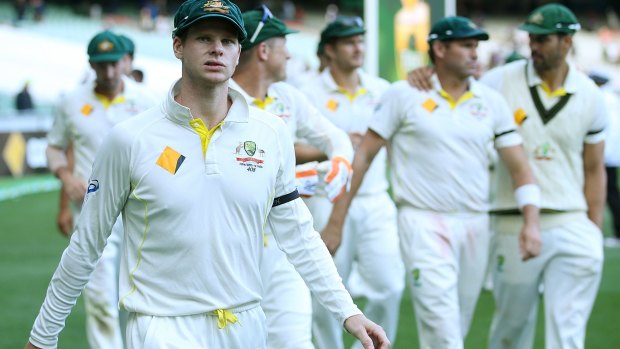 Steve Smith leads the Australian team off the field after the Test ended in a draw.