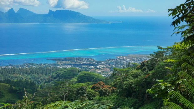 The view from the mountains of the north-west coast of Tahiti with Moorea island in the background.