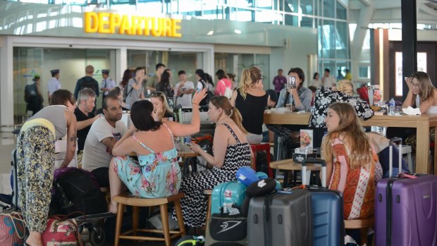 Thousands are stranded in Bali as airport closes due to volcanic ash cloud.