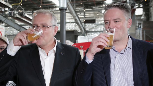 Treasurer Scott Morrison and Minister for Finance Mathias Cormann hope voters will toast their health at the next election.