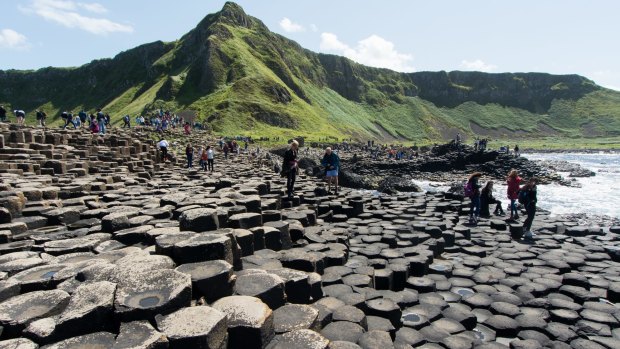 Bushmills: crowd of tourists to see Giant's Causeway.