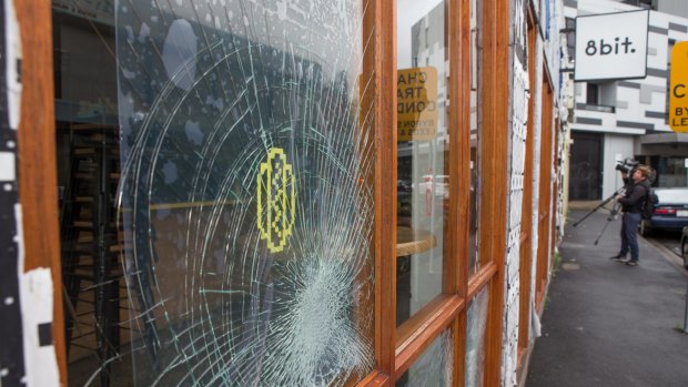 Sixteen window panels were smashed at 8-Bit over the New Year's Eve weekend. The burger restaurant has been targeted again.