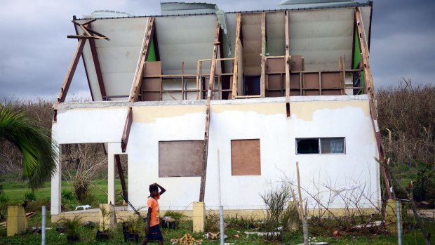 A house damaged by Cyclone Pam on the Vanuatu island of Tanna.