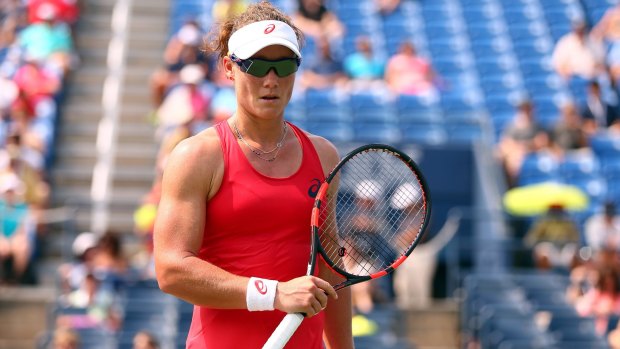 Samantha Stosur of Australia ponders her next move during her second-round match against Evgeniya Rodina of Russia.