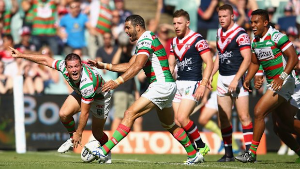 Delighted: Paul Carter celebrates scoring his try in the first half against the Sydney Roosters earlier this year.