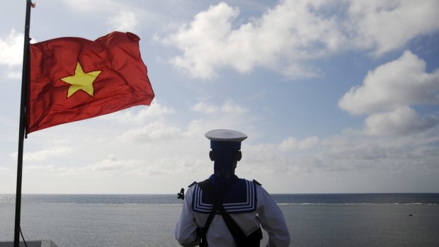 A Vietnamese naval soldier stands quard at Thuyen Chai island in the Spratly archipelago in 2013.