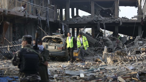The devastation caused when a bomb hidden in a truck exploded near a Defence Ministry compound before dawn on Friday. Police chief Abdul Rahman Rahimi said all of the victims were civilians.