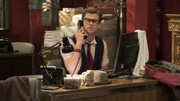 Who you gonna call? Chris Hemsworth as the team's handsome airhead receptionist Kevin.