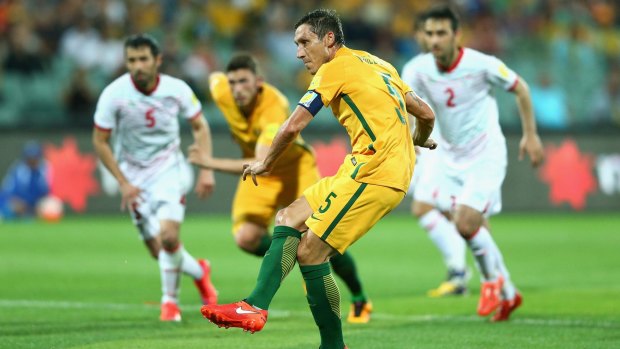 Mark Milligan slots home a penalty.