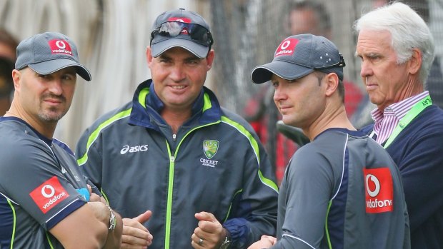 Michael Clarke talks to Australian chairman of selectors John Inverarity (right), Australian coach Mickey Arthur (centre) and physiotherapist Alex Kountouris (left). 