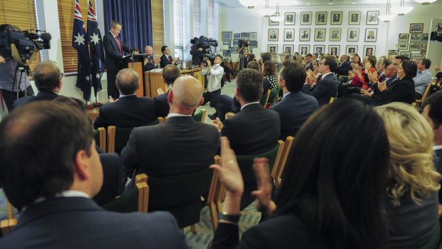 Labor MPs and senators applaud Opposition Leader Bill Shorten.