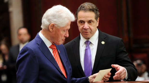 Former President Bill Clinton, left, and New York Governor Andrew Cuomo, of New York state's Electoral College cast their ballots for Hillary Clinton in Albany.