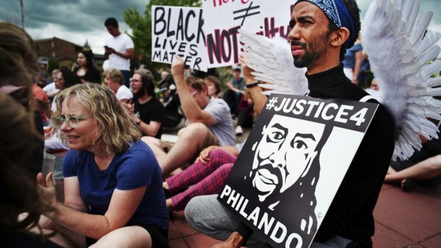Protesters in St Anthony, Minnesota, in June after the verdict in the Philando Castile case.