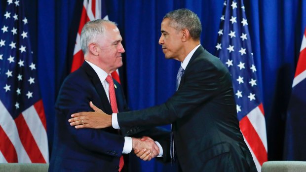 Goodbye and good luck: Barack Obama   with  Malcolm Turnbull in Lima.