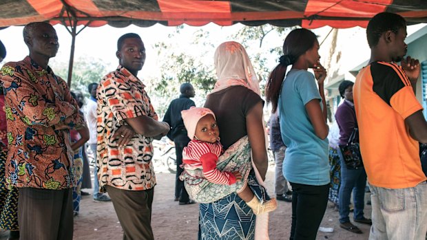 Voters queue before casting their ballots in Ouagadougou, Burkina Faso, on Sunday.