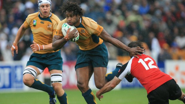 Wallaby gold: Lote Tuqiri on the run for Australia versus Canada at Bordeaux  in the 2007 World Cup.