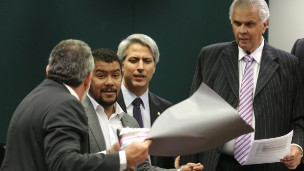 Policitians clash during a protest against Eduardo Cunha, at the Committee of Ethics of the lower house in Brasilia, last month.