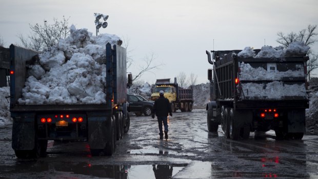 Removal: Snow from around Buffalo is carted to the Buffalo Central Terminal. 