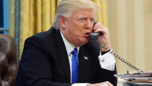 Donald Trump working the phone.