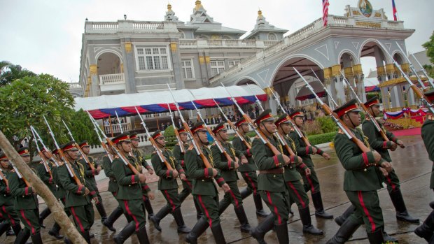 Members of a guard of honour in Vientiane, Laos, on Tuesday.