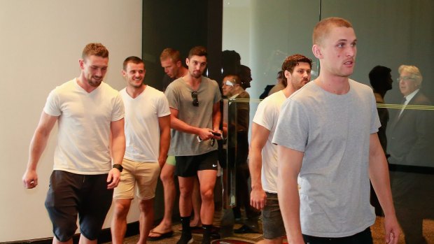 Essendon players leave after speaking to the media at the Pullman Hotel in Melbourne on Tuesday.