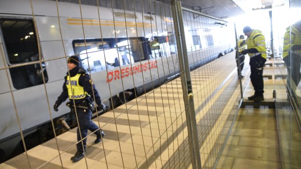 A temporary fence erected between domestic and international train tracks at Hyllie train station in southern Malmo, Sweden as authorities prepare to provide border checks for migrants hoping to enter Sweden. The Hyllie station is the first stop after crossing the Oresund Bridge from Denmark.   