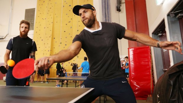 Batting on: Chris Judd enjoys a game of table tennis during the Blues' Mount Buller camp.