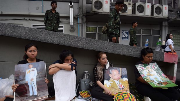 Crowds gather to mourn following the death of King Bhumibol Adulyadej.