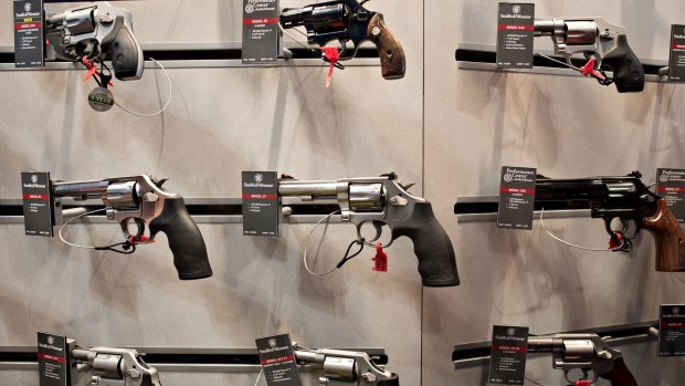 Guns on display in the Smith & Wesson booth at a gun expo in Tennessee in April. 