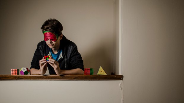 Rubik's cube genius Jayden McNeill can now solve the puzzle while wearing a blindfold.