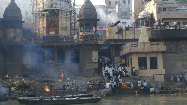 The main cremation ghat on the Ganges River at Varanasi, India.
