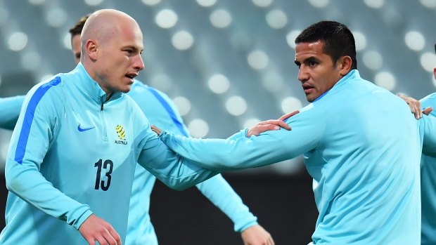 Aaron Mooy and Tim Cahill of Australia.