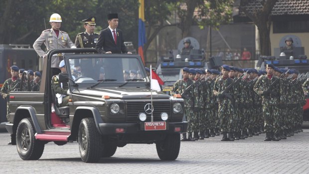 Indonesian President Joko Widodo inspects the Mobile Police Brigade earlier this month. 