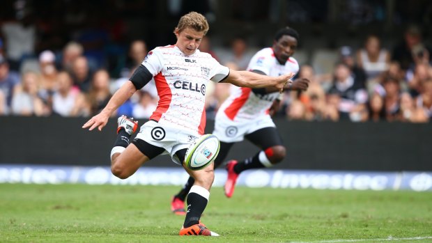 Kicking on: Patrick Lambie's boot proved the difference for the Sharks against the Jaguares.