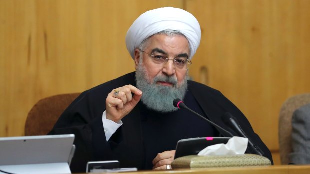 Iranian President Hassan Rouhani at a cabinet meeting on New Year's Eve.