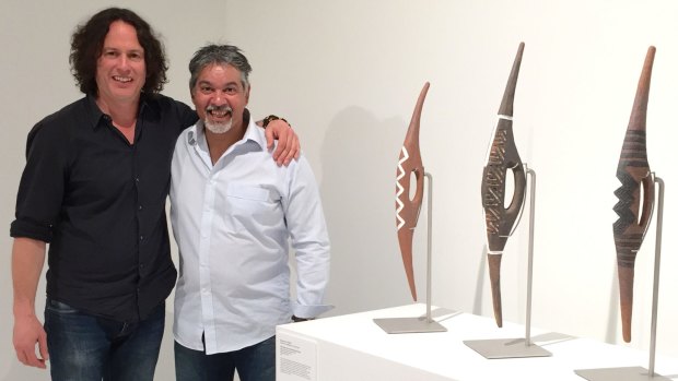 Kent Morris with artist Raymond Young and his work, Standing Strong, Standing Proud.