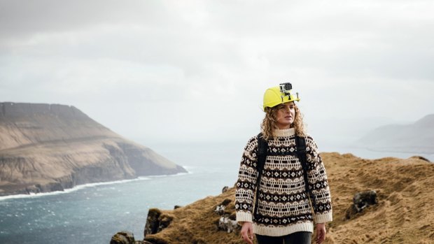 Kristina Sandberg Joensen, a tour guide for Visit Faroe Islands, with her helmet fitted with a live-streaming camera.