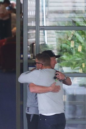 Heartbreaking: Australian cricketers Brad Haddin and Aaron Finch at St Vincent's Hospital in Sydney to see teammate Phillip Hughes.