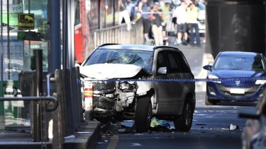 The SUV hit pedestrians before smashing into a tram stop.