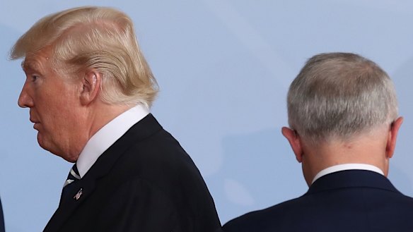 Donald Trump described the deal as "stupid" and "rotten" in his phone call with Malcolm Turnbull, right.