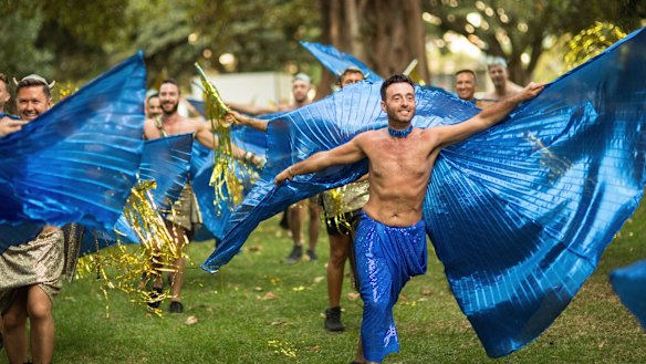 Performers rehearse their routines ahead of the parade.