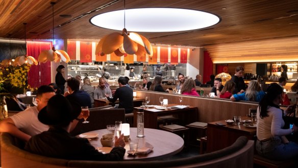 Generously curved booths inside Toko's new CBD digs.