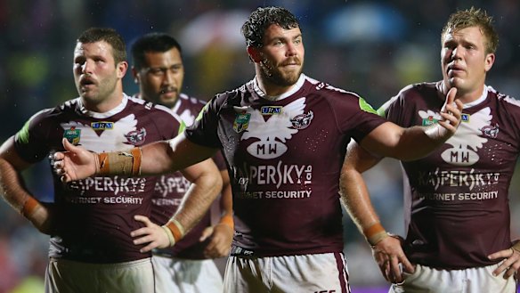 All over: Blake Leary, Josh Starling and Jake Trbojevic of the Sea Eagles look dejected at Brookvale. 