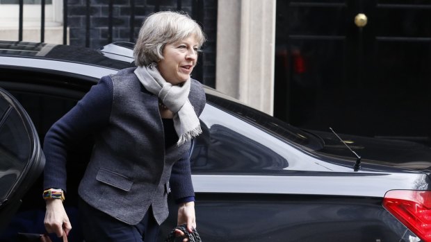 Home Secretary Theresa May arrives for the cabinet meeting at Downing Street on Saturday.