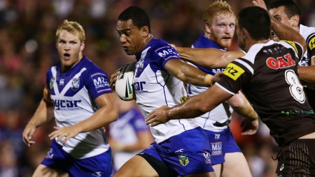 Where there's a Will: Fullback Will Hopoate makes a break as the Bulldogs fight their way back into the match.