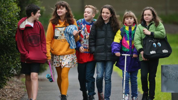 Devlin Walker and his buddies walking to school in Abbotsford, on July 14, 2014 in Melbourne.