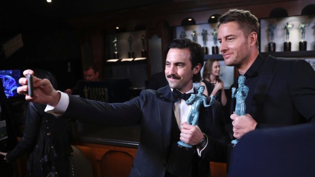 Milo Ventimiglia, left, and Justin Hartley with their awards for outstanding performance by an ensemble in a drama series for This Is Us at the 24th annual Screen Actors Guild Awards.