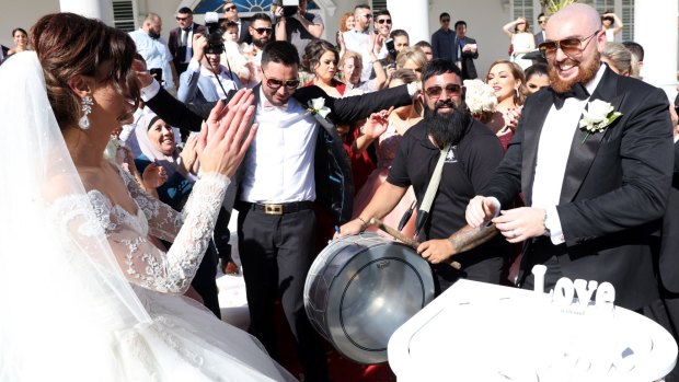 Salim Mehajer dances at the nuptials of his sister Kat and Ibraham Sakalaki at the ceremony.