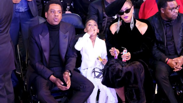 Jay-Z, Blue Ivy Carter, and Beyonce at the 60th Annual Grammy Awards in New York.