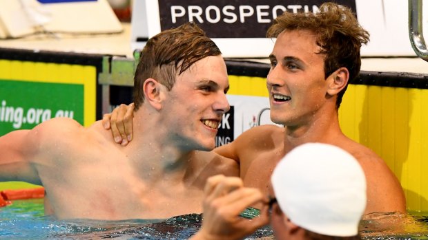 Nice touch: Cameron McEvoy is congratulated by Kyle Chalmers.